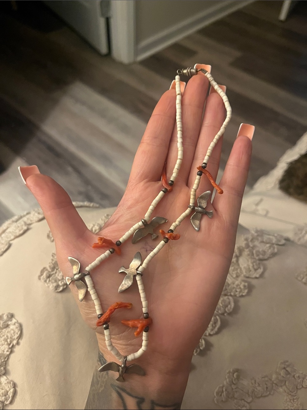 Handmade White Bead Necklace with Orange Accents and Silver Bird Charms